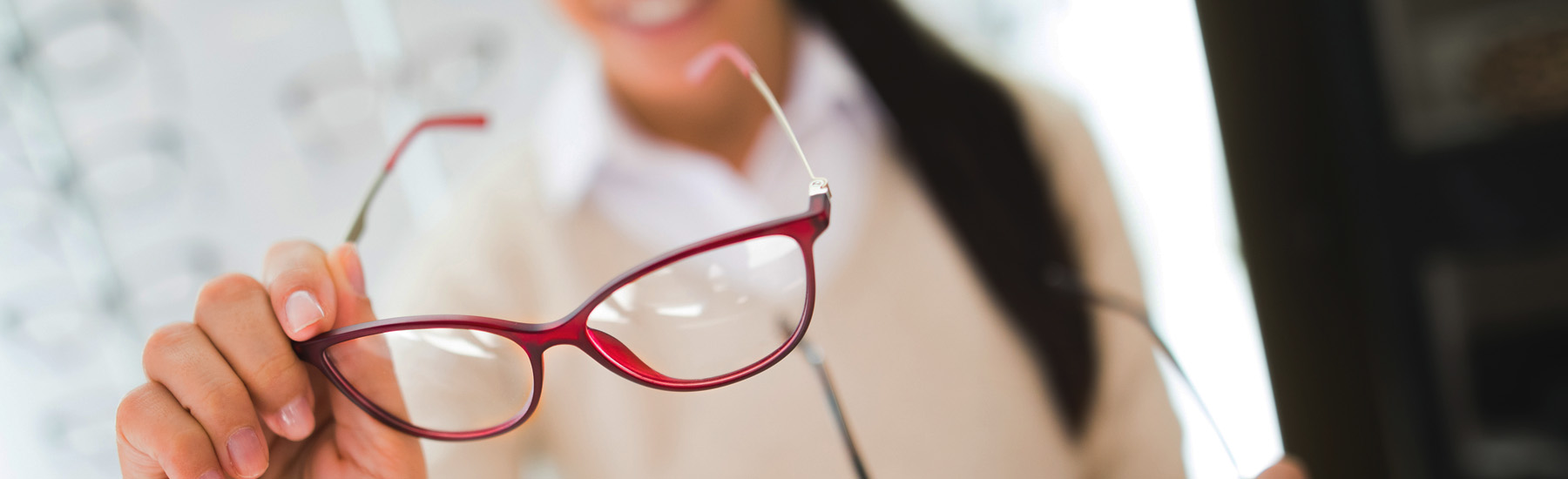 Woman browsing different sets of frames