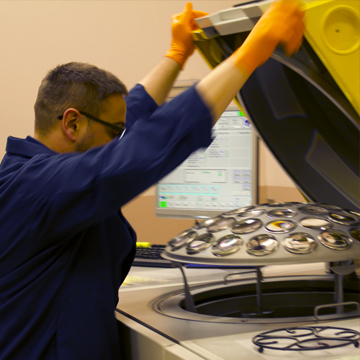 Lab Technician working in AR coating lab