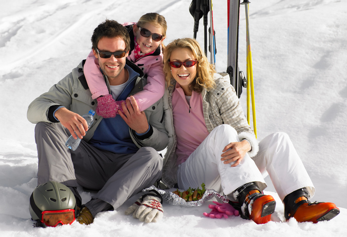 a family wearing coolers from Optics Manufacturers Pennsylvania