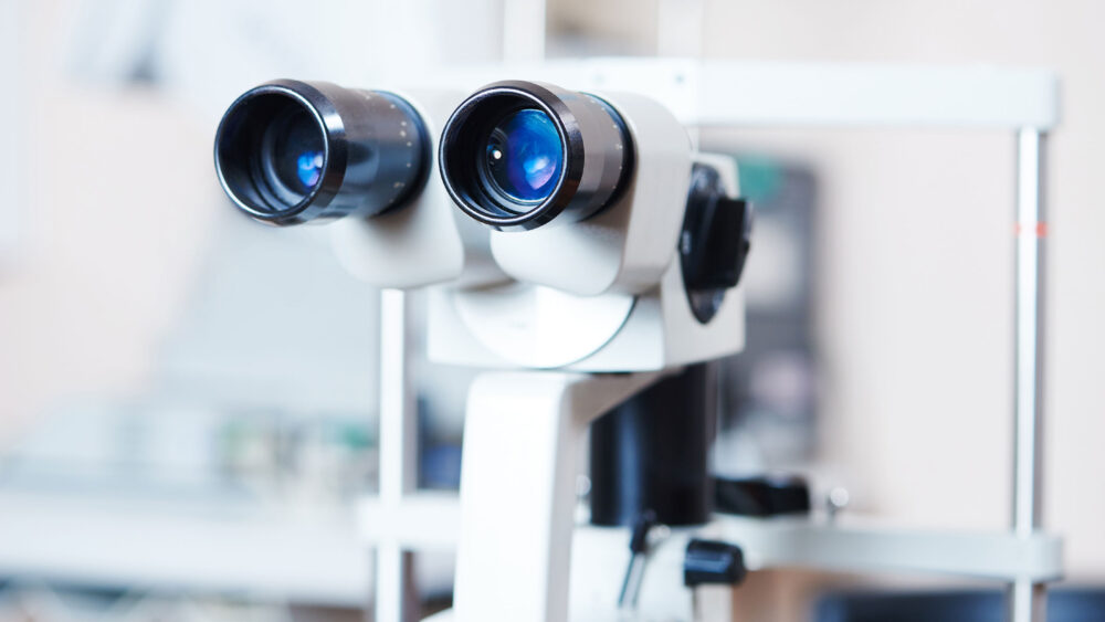 An eye exam machine with two large lenses, used for Wholesale Optical Lenses.